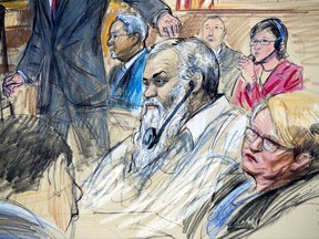 FILE - This Oct. 2, 2017, file courtroom sketch depicts Ahmed Abu Khattala listening to a interpreter through earphones during the opening statement by assistant U.S. attorney John Crabb, second from left, at federal court in Washington, in the trial presided by U.S. District Judge Christopher Cooper. Defense attorney Jeffery Robinson, sits behind Crabb in a light blue suit and Michelle Peterson, also a member of the defense team, is at far right. A federal jury has found a suspected Libyan militant not guilty of the most serious charges stemming from the 2012 Benghazi attacks that killed the U.S. ambassador and three other Americans. Jurors on Nov. 28, 2017, convicted Ahmed Abu Khattala of terrorism-related charges but acquitted him of murder. (Dana Verkouteren via AP)