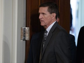 FILE - In this Feb. 13, 2017 file photo, Michael Flynn arrives for a news conference in the East Room of the White House in Washington. The Defense Intelligence Agency is refusing to publicly release a wide array of documents related to former National Security Adviser Michael Flynn, saying that turning them over could interfere with ongoing congressional and federal investigations. (AP Photo/Evan Vucci, File)
