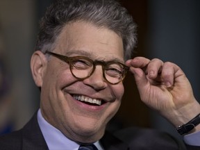 FILE - In this June 15, 2016, file photo, Sen. Al Franken, D-Minn., laughs during an interview with The Associated Press in his office on Capitol Hill in Washington. Franken has spent much of his nine years as senator trying to shed his funnyman image and digging into issues. That rising trajectory has been interrupted by allegations that he forcibly kissed one woman and squeezed another's buttocks without their permission.(AP Photo/J. Scott Applewhite, File)