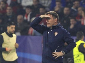 Sevilla coach Eduardo Berizzo stands by the bench during a Champions League group E soccer match between Sevilla and Liverpool, at the Ramon Sanchez Pizjuan stadium in Seville, Spain, Tuesday, Nov. 21, 2017. (AP Photo/Miguel Morenatti)