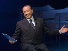 Italian former Prime Minister and leader of "Forza Italia" party, Silvio Berlusconi, gestures during the recording of Rai TV program 'Porta a porta', in Rome Thursday,  Nov. 16, 2017. (Claudio Peri/ANSA via AP)