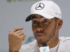Mercedes driver Lewis Hamilton of Britain speaks during a news conference in Sao Paulo, Brazil, Wednesday, Nov. 8, 2017. Hamilton will compete Sunday in the Brazilian Formula One Grand Prix at Sao Paulo's Interlagos circuit. (AP Photo/Andre Penner)