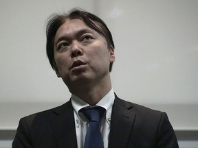 In this Tuesday, Oct. 31, 2017 photo, Koichiro Iizuka, whose mother Yaeko Taguchi was abducted by North Korean agents in 1978 when he was a baby, speaks during the interview with the Associated Press in Tokyo. Iizuka has high hopes that President Donald Trump's outreach will draw public attention to the issue. Trump is expected to meet with some relatives of the abductees Monday, Nov. 6,  during his Tokyo visit. Japan says North Korea abducted at least 17 citizens in the 1970s and '80s to train its spies to pass as Japanese. North Korea allowed five to visit Japan in 2002, and they stayed instead of returning to North Korea. (AP Photo/Eugene Hoshiko)