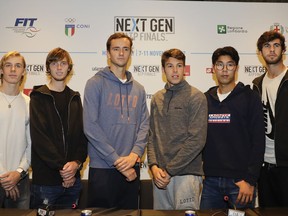 From left, U.S. Jared Donaldson, Denis Shapovalov of Canada, Andrey Rublev of Russia, Daniil Medvedev of Russia, Gianluigi Quinzi of Italy, Hyeon Chung of Korea, Karen Khachanov of Russia and Borna Coric of Croatia, pose prior to a press conference to present the ATP Next Gen Finals tennis tournament, featuring the eight qualifiers, in Milan, Italy, Monday, Nov. 6, 2017. (AP Photo/Luca Bruno)