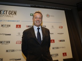 ATP President Chris Kermode smiles during a press conference to present the ATP Next Gen Finals tennis tournament, in Milan, Italy, Monday, Nov. 6, 2017. Organizers apologized Monday for a ceremony involving female models provocatively revealing the letters "A'' or "B'' to determine the draw for the ATP's Next Gen Finals tennis tournament. The ceremony on Sunday was supposed to highlight Milan's status in the fashion industry. (AP Photo/Luca Bruno)
