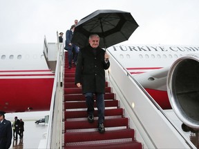 Turkey's Prime Minister Binali Yildirim arrives in Washington, late Tuesday, Nov. 7, 2017. Yildirim is in the United States to meet U.S. Vice President Mike Pence for talks aimed at mending frayed ties between the two NATO allies, including over Turkish demands for the extradition U.S.-based cleric Fethullah Gulen, who is blamed for last year's failed coup, and Washington's backing of Syrian Kurdish militia, whom Turkey considers to be terrorists. (Pool via AP)