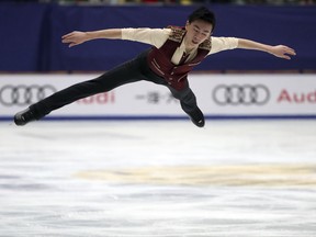Vincent Zhou of the United States competes in the Mens Free Skating during the Audi Cup of China ISU Grand Prix of Figure Skating 2017 at the Capital Gymnasium in Beijing, Saturday, Nov. 4, 2017. (AP Photo/Mark Schiefelbein)