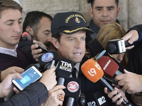 Captain Gabriel Galeazzi talks to journalists regarding a missing submarine at the naval base in Mar del Plata, Argentina, Monday, Nov. 20, 2017. Authorities last had contact with submarine ARA San Juan on Wednesday as it was on a voyage from the extreme southern port of Ushuaia to the city of Mar del Plata. (AP Photo/Marina Devo)