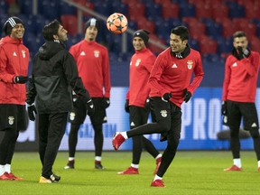 Benfica teammates attend a training session at CSKA Moscow's stadium in Moscow, Russia, Tuesday, Nov. 21, 2017. Benfica will face CSKA Moscow at Wednesday in a Champions League group A soccer match. (AP Photo/Pavel Golovkin)