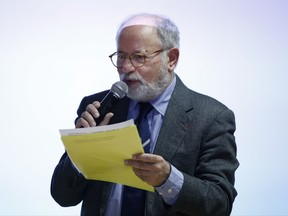 Samuel Sandler, grandfather of Arie and Gabriel Sandler who were gunned down by Mohamed Merah, gives a speech in Paris middle-school, Wednesday, Nov. 15, 2017. A Paris middle-school classroom is getting a poignant honor: It's being named after two Jewish boys gunned down by an Islamic extremist in Toulouse in 2012. The naming is part of a broader effort to teach tolerance and fight encroaching racism and anti-Semitism through education. (AP Photo/Thibault Camus)