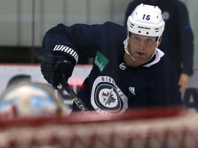 Matt Hendricks fires a shot on goal during Winnipeg Jets practice at Bell MTS Iceplex in Winnipeg on Wed., Oct. 25, 2017.