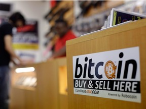 A Bitcoin sign at a gun store in Austin, Texas. Once disregarded as a plaything for nerds and criminals, Bitcoin has upended the financial world order and rocketed into the mainstream.