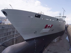 The Resolve-Class naval support ship Asterix is unveiled at a ceremony at the Davie shipyard in Levis, Que., on Thursday, July 20, 2017.