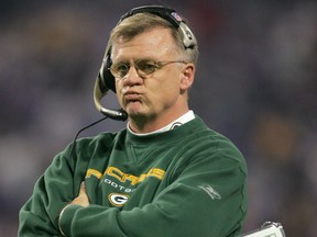 In this Dec. 24, 2004 file photo, Mike Sherman coaches the Green Bay Packers.