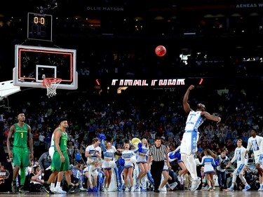 North Carolina guard Theo Pinson throws the ball in the air after defeating the Oregon Ducks in the national college basketball semifinal on April 1.