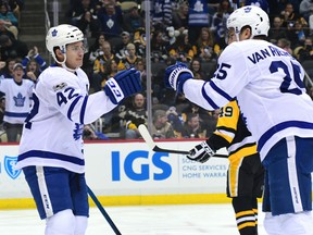 Tyler Bozak celebrates with Toronto Maple Leafs teammate James van Riemsdyk after scoring a goal against the Penguins during their game in Pittsburgh on Saturday night.