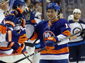 Mathew Barzal of the Islanders celebrates his third goal against the Winnipeg Jets at the Barclays Center in New York on Saturday. The Islanders won 5-2.