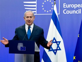 Israeli Prime Minister Benjamin Netanyahu addresses a media conference at the EU Council building in Brussels on Monday.