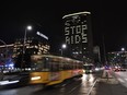 Some windows of the Pirelli tower are lighted to write the words "Stop AIDS", to commemorate the World Day of the Fight against AIDS on December 1, 2017 in Milan.