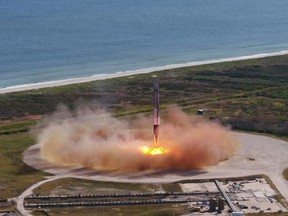 SpaceX Falcon 9 returns to Landing Zone 1 on Dec. 15, 2017 in Cape Canaveral, Florida. For the first time, SpaceX on Friday launched both a rocket and a cargo ship that have flown before, a step forward in the company's goal to lower the cost of spaceflight.