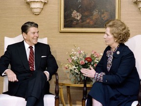 This file photo taken on October 23, 1985 shows U.S. President Ronald Reagan holding a bilateral meeting with British Prime Minister Margaret Thatcher at the Waldorf Astoria Hotel. Margaret Thatcher refused a request to fly a panda in the back of her Concorde when she visited Washington for her first summit with Ronald Reagan, according to papers released on December 29, 2017.