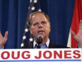 Sen.-elect Doug Jones speaks during a news conference Wednesday, Dec. 13, 2017, in Birmingham, Ala. Weary national Republicans breathed a collective sigh of relief on Wednesday, a day after voters knocked out their own party's scandal-plagued candidate in deep-red Alabama.