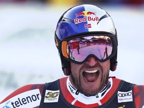 Norway's Aksel Lund Svindal celebrates in the finish area of an alpine ski, men's World Cup downhill, in Val Gardena, Italy, Saturday, Dec. 16, 2017.