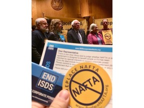 Bernie Sanders (centre) and other members of the anti-NAFTA left attend a news conference on Capitol Hill in Washington, D.C,, Wednesday, Dec.13, 2017