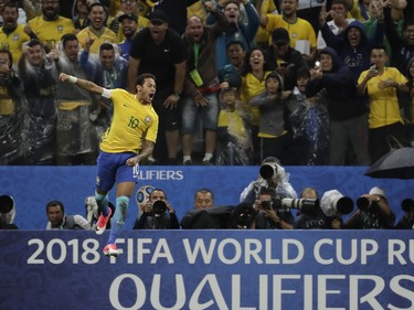 Brazilian forward Neymar celebrates his goal in a World Cup qualifying match against Paraguay in Sao Paulo, Brazil, on March 28.