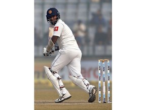 Sri Lanka's Angelo Mathews watches his shot during the third day of their third test cricket match against India in New Delhi, India, Monday, Dec. 4, 2017.