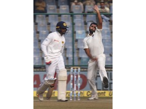 India's Mohammed Shami, right, bowls a delivery during the fifth day of their third test cricket match against Sri Lanka in New Delhi, India, Wednesday, Dec. 6, 2017.