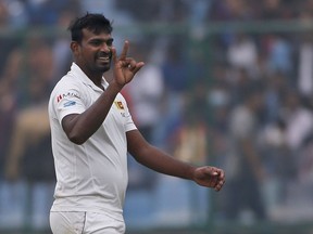 Sri Lanka's Lahiru Gamage gestures after dismissing India's captain Virat Kohli during the fourth day of their third test cricket match in New Delhi, India, Tuesday, Dec. 5, 2017.