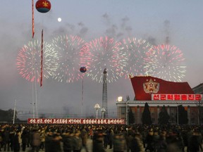 In this Friday, Dec. 1, 2017, file photo, fireworks explode above the Taedong river as people gather at Kim Il Sung Square for a rally in Pyongyang, North Korea. North Koreans attended a rally Friday in Pyongyang's central Kim Il Sung Square to show support for the country's latest missile test.