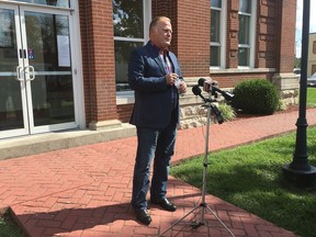FILE - In this Oct. 4, 2016 file photo, Kentucky state Rep. Dan Johnson speaks during a news conference outside the Bullitt County courthouse in Shepherdsville, Ky. Johnson, who attracted national attention last year when he compared President Barack Obama and his wife to monkeys has been accused of sexual assault. The Kentucky Center for Investigative Reporting quotes Maranda Richmond as saying she has asked Louisville police to reopen an investigation of Dan Johnson.