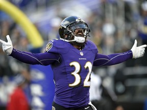 Baltimore Ravens free safety Eric Weddle celebrates after running an intercepted pass back for a touchdown in the second half of an NFL football game against the Detroit Lions, Sunday, Dec. 3, 2017, in Baltimore.