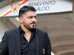 AC Milan coach Gennaro Gattuso walks on the pitch prior the start of the Italian Serie A soccer match between Benevento and AC Milan in Benevento, Italy, Sunday, Dec. 3, 2017.