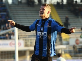 Atalanta's Andreas Cornelius celebrates after scoring his side's first goal during an Italian Cup soccer match between Atalanta and Sassuolo at the Atleti Azzurri D'Italia in Bergamo, Italy, Wednesday, Dec. 20, 2017.
