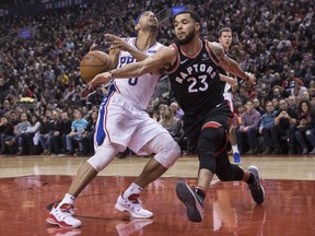 Fred VanVleet of the Raptors steals the ball from the Philadelphia 76ers' Jerryd Bayless during first half NBA action in Toronto on Saturday night.