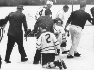 Bobby Baun is stretchered off the ice in the 1964 Stanley Cup final.