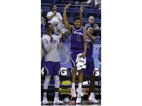 Central Arkansas guard Darraja Parnell (12) and Matthew Mondesir (20) celebrate a score against California during the second half of an NCAA college basketball game Wednesday, Dec. 6, 2017, in Berkeley, Calif.