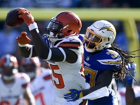 Los Angeles Chargers strong safety Jahleel Addae, right, breaks up a pass intended for Cleveland Browns tight end David Njoku during the first half of an NFL football game Sunday, Dec. 3, 2017, in Carson, Calif.