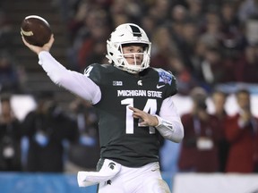 Michigan State quarterback Brian Lewerke throws during the first half of the Holiday Bowl NCAA college football game against Washington State on Thursday, Dec. 28, 2017, in San Diego.