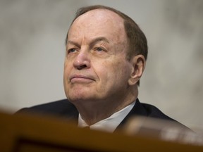 FILE- In this June 21, 2016 file photo, Sen. Richard Shelby, R-Ala., listens at a U.S. monetary policy meeting on Capitol Hill in Washington. Most statewide Republican officeholders in Alabama say they're voting for Roy Moore for U.S. Senate. But the state's senior U.S. senator, Shelby, didn't vote for Moore.