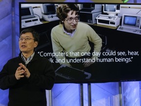 Harry Shum, executive vice president of Microsoft's Artificial Intelligence and Research, speaks at a Microsoft event in San Francisco, Wednesday, Dec. 13, 2017. Microsoft rolled out new features on its Bing search engine powered by artificial intelligence, including one that summarizes the two opposing sides of contentious questions, and another that measures how many reputable sources are behind a given answer.
