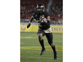 Purdue wide receiver Anthony Mahoungou runs for a touchdown against Arizona during the first half of the Foster Farms Bowl NCAA college football game Wednesday, Dec. 27, 2017, in Santa Clara, Calif.