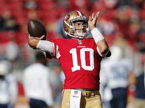 San Francisco 49ers quarterback Jimmy Garoppolo (10) warms up before an NFL football game against the Tennessee Titans, Sunday, Dec. 17, 2017, in Santa Clara, Calif.