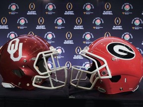 Helmets for Georgia and Oklahoma are displayed at a news conference in Los Angeles on Thursday, Dec. 28, 2017. Georgia will take on Oklahoma on Monday, Jan. 1, 2018.