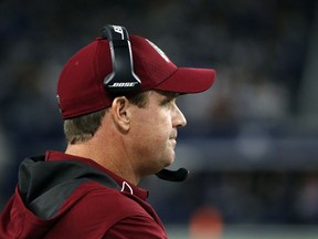 Washington Redskins head coach Jay Gruden watches play from the sideline in the first half of an NFL football game against the Dallas Cowboys on Thursday, Nov. 30, 2017, in Arlington, Texas. (AP Photo/Michael Ainsworth)