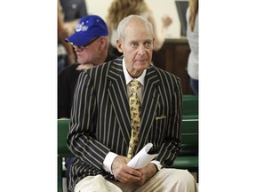 FILE - In this April 8, 2015, file photo, Charles Cella, owner of Oaklawn Park, watches the crowd after post position draw for the running of the Arkansas Derby horse race at Oaklawn Park in Hot Springs, Ark. Cella, who helped turn Oaklawn Park into a major racing destination in the South as a third-generation president of the Arkansas track and a thoroughbred owner himself, died of complications from Parkinson's disease Wednesday, Dec. 6, 2017, at his home in St. Louis. He was 81.