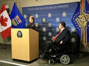 Calgary Police Inspector Leah Barber and federal minister Kent Hehr meet with reporters in Calgary on Monday, Dec. 18. 2017, to announce funding for a program to prevent the radicalization of youth.THE CANADIAN PRESS/HO-Government of Canada MANDATORY CREDIT